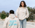 The “Rescue, Love, Restore” beige hoodie