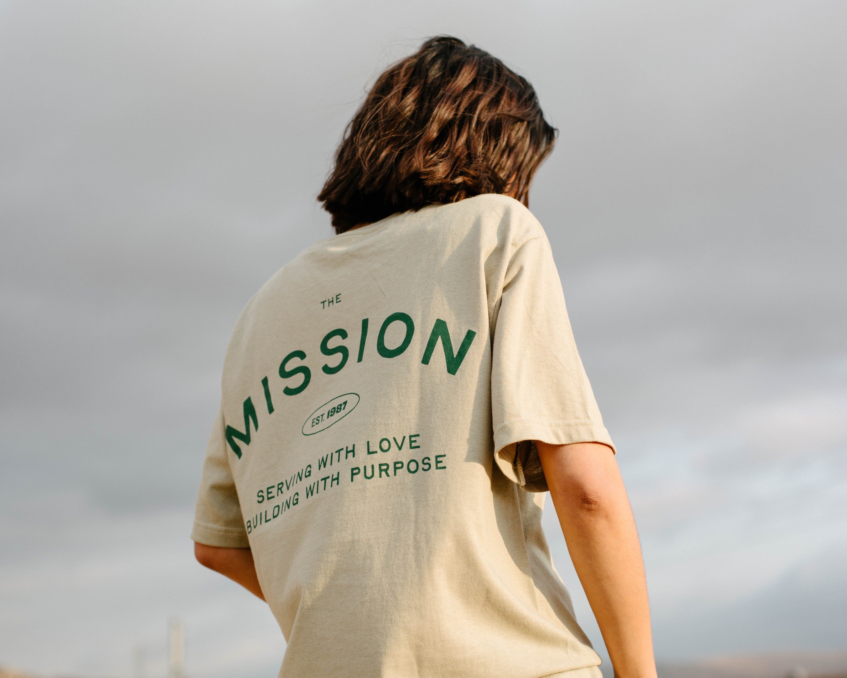 The beige T-shirt