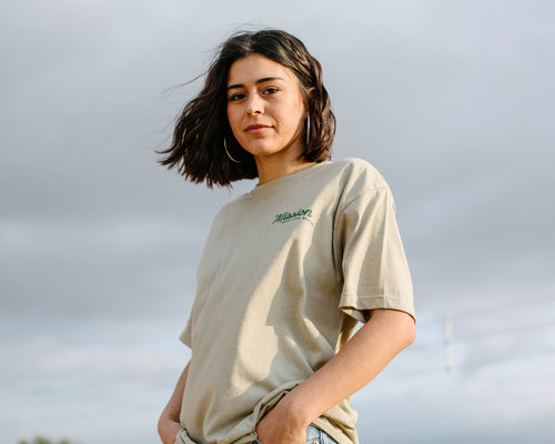 The beige T-shirt