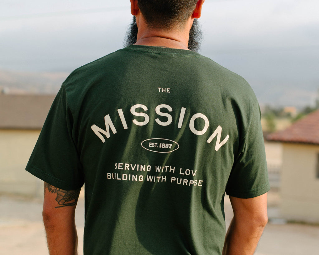 The green T-shirt